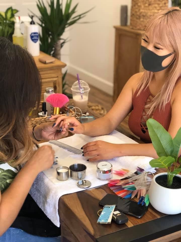 A manicure in progress at Siren + Grace